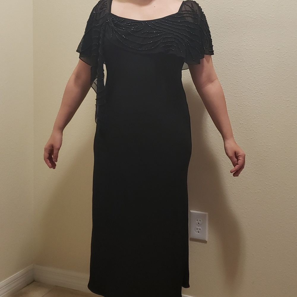 Black sheath dress with flowy beaded neckline